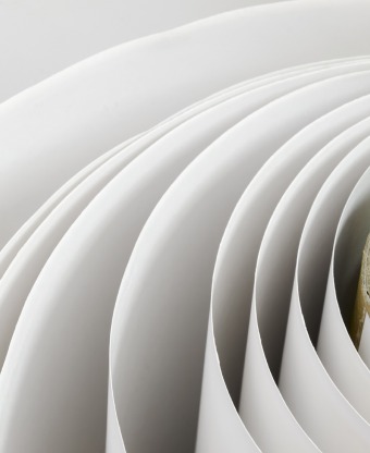 Curved sheets of white paper
